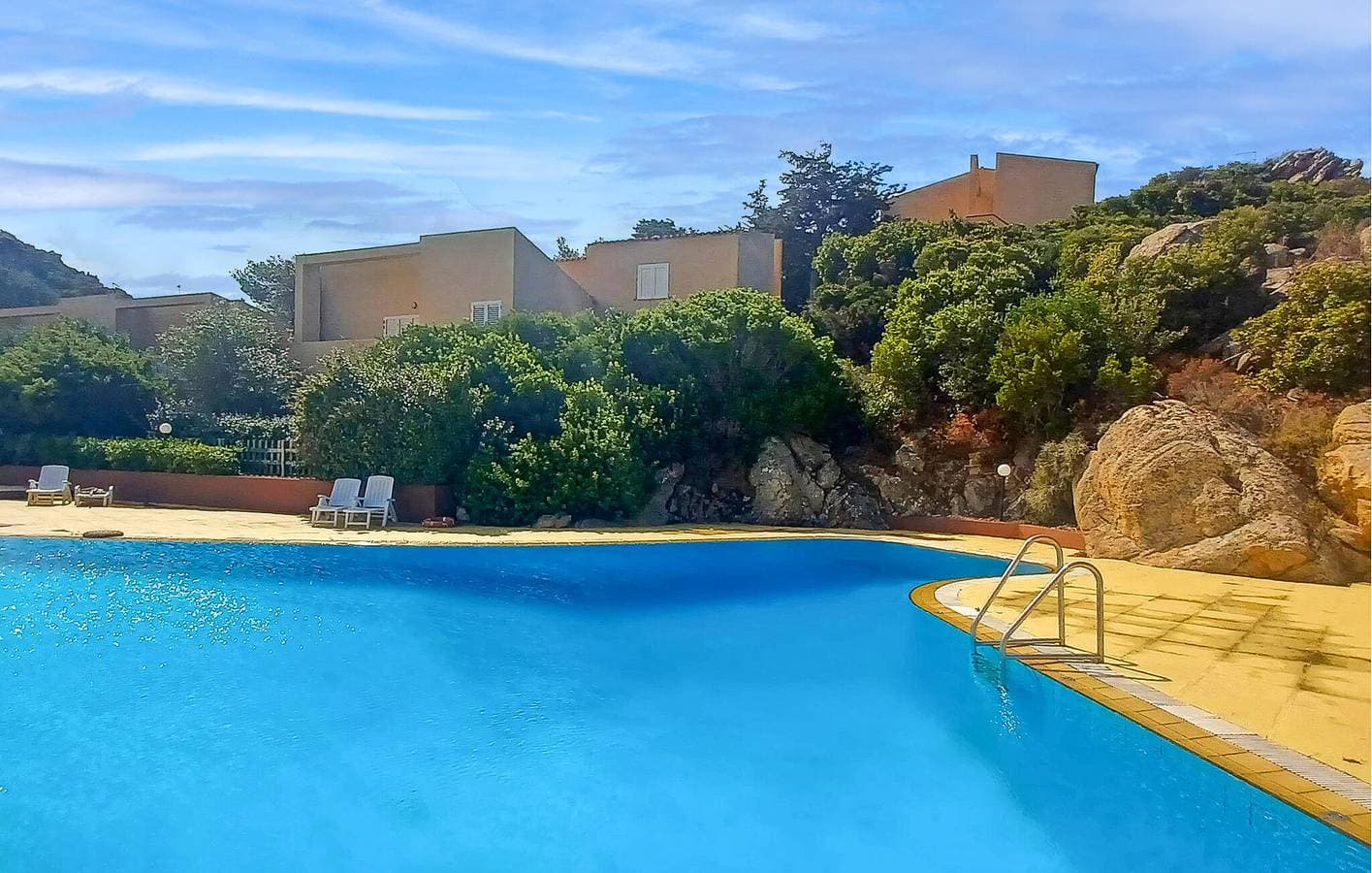 Foto 13 von 26: Gemütliche Ferienwohnung mit Pool, Küche und nur 1 km vom Li Cozi Beach entfernt