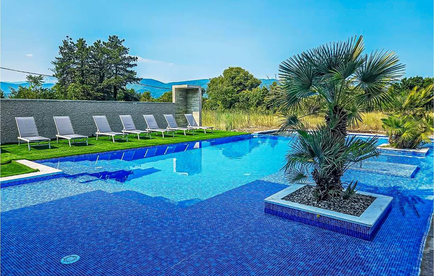 Foto 2 von 40: Ferienhaus für 14 Personen mit Pool