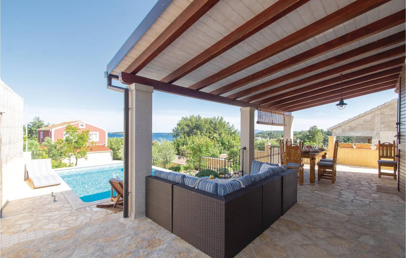Foto 11 von 44: Gemütliche Unterkunft am Meer mit Pool, Terrasse und direktem Zugang zum Strand