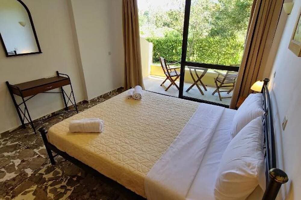 Foto 2 von 30: Cozy studio in a green peaceful area near the beach in delightful Lefkimmi Corfu