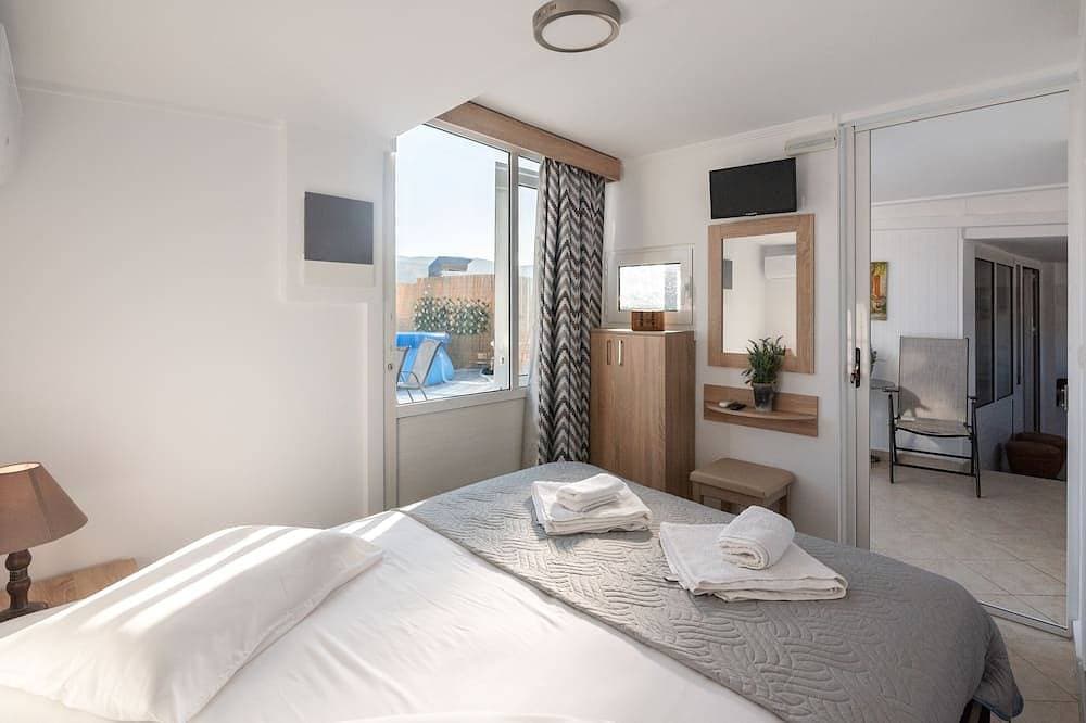 Foto 10 von 30: Family Apartment with terrace and sea view 10 minutes from the beach
