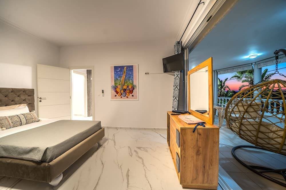 Foto 2 von 30: Luxury White House - Family Villa Near Sea - Zorbas Beach with playground, bikes