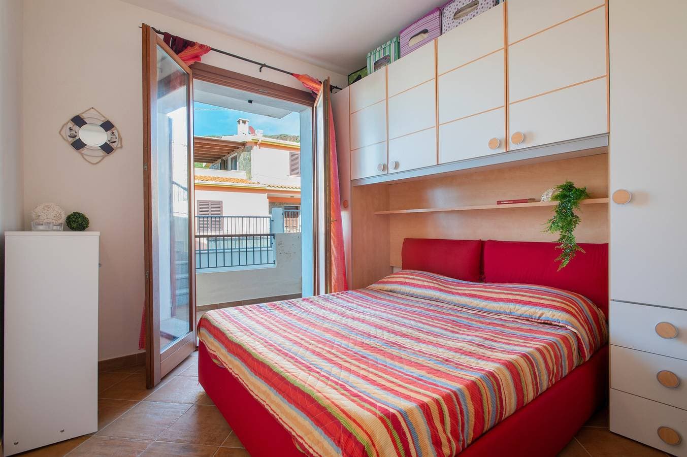 Foto 13 von 26: Ferienwohnung 'Gio's' mit Gemeinschaftspool, privatem Garten und Klimaanlage