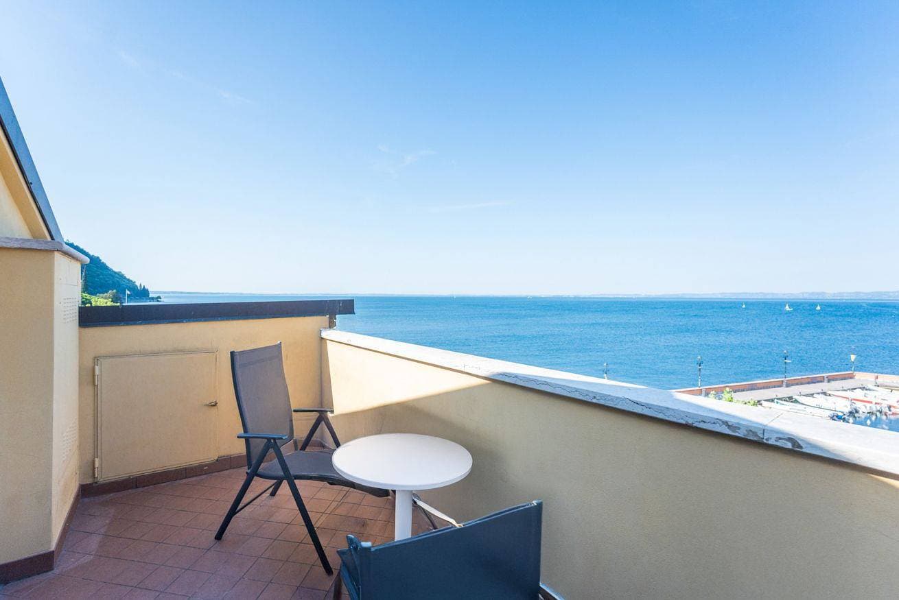 Foto 4 von 25: ApartmentsGarda - Baia Del Garda 5