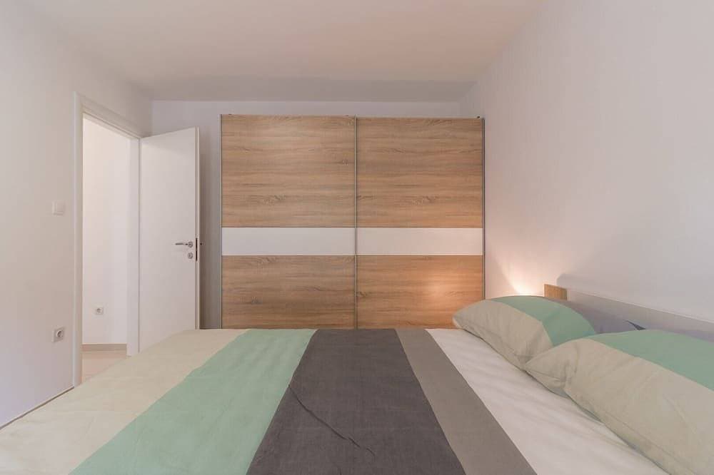 Foto 4 von 23: Comfortable holiday house with apartments / Amazing spacious apartment with patio and grill / A1