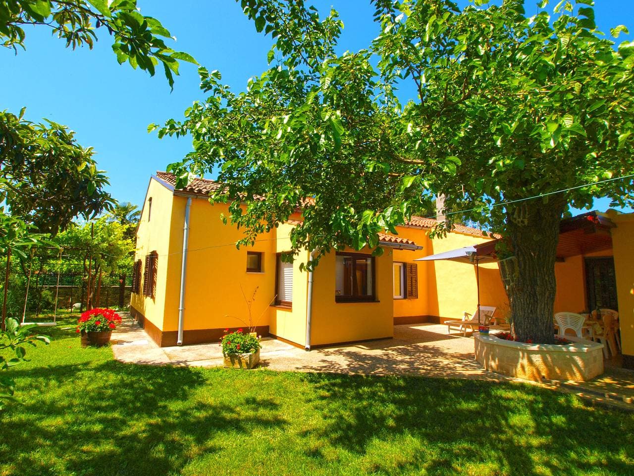 Foto 2 von 32: Ferienhaus für 5 Personen mit Terrasse