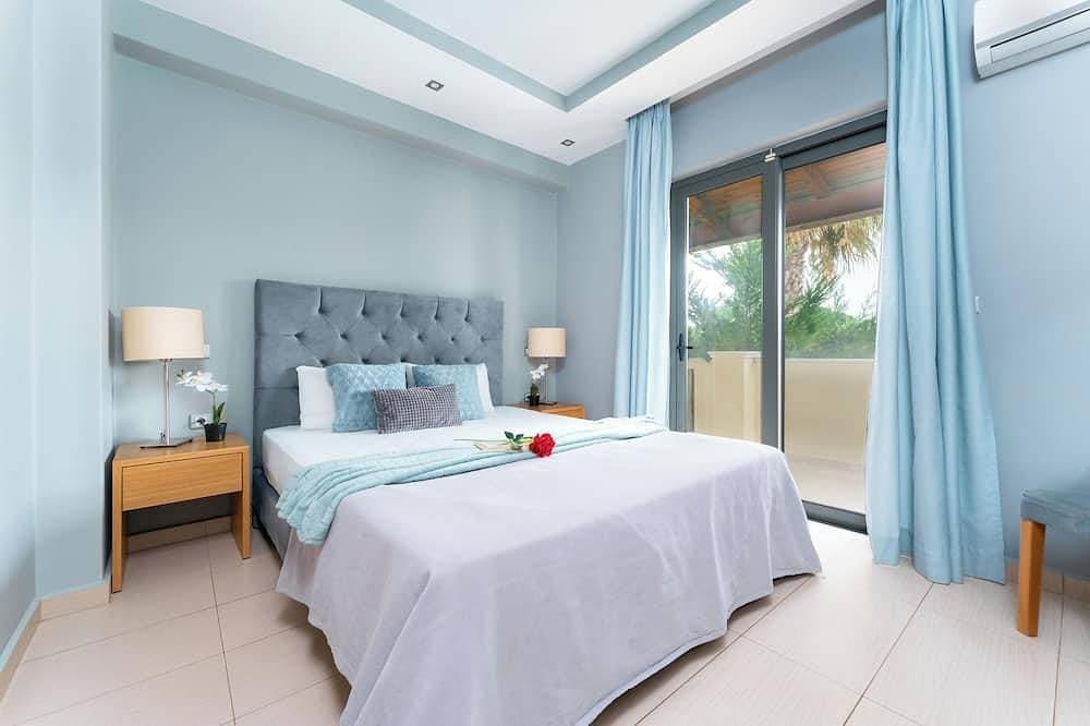 Foto 5 von 29: Astarte Villas - Coco Palm Deluxe 3 Bedroom Suite