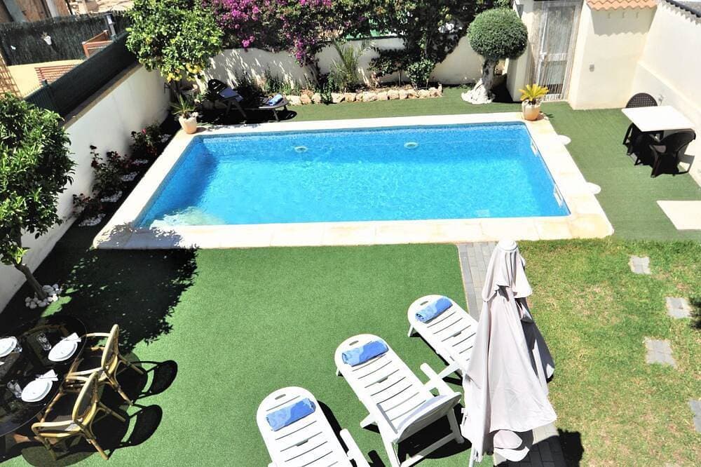 Foto 13 von 30: Villa Hugo Casa en zona residencial tranquila Bahía Grande con Piscina Privada.