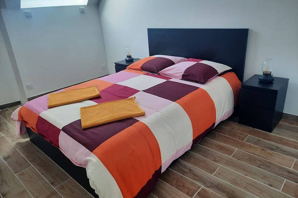 Foto 2 von 30: La Rose des Vents\" duplex apartment with sea view and Arromanches pontoons