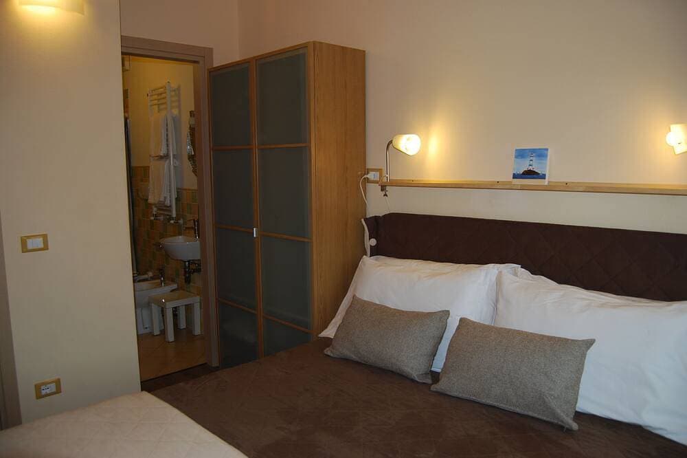 Foto 6 von 25: Burlamacco Gold modern rooms in the center of Viareggio 350 meters from the Sea