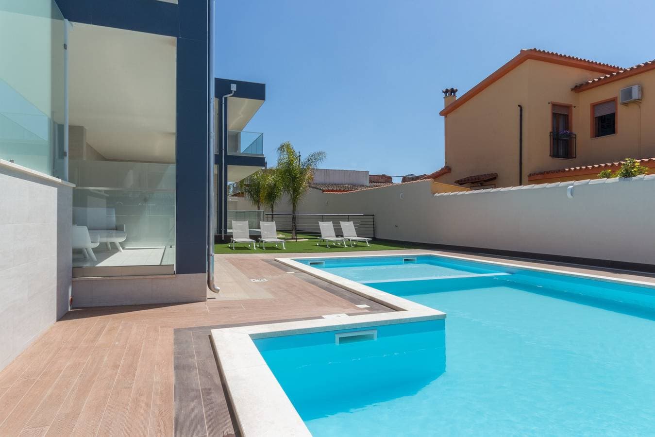 Foto 11 von 12: Studio "Residenz Meridian Unità 5" in Strandnähe, mit Bergblick, Pool & WLAN
