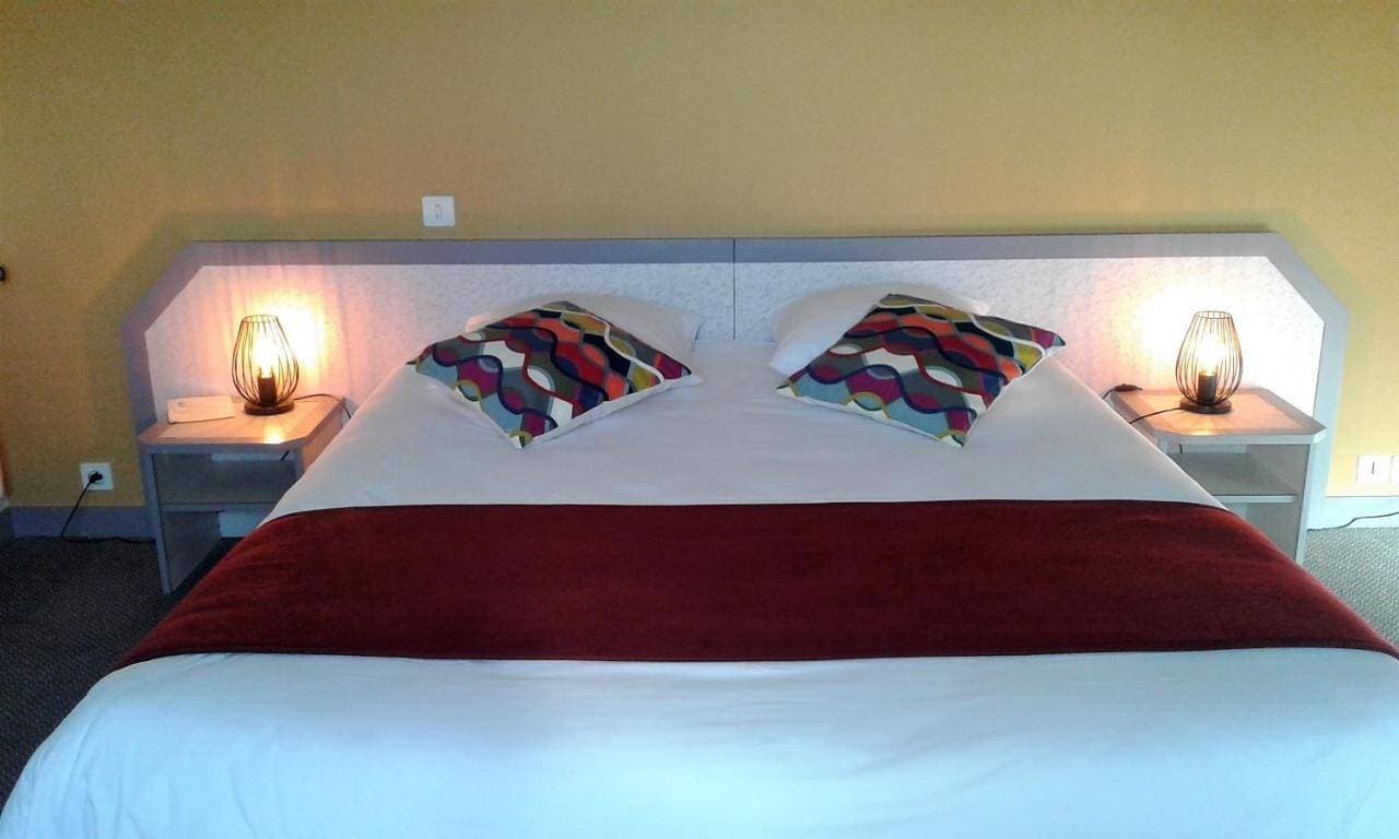 Foto 2 von 10: Triple Room with Garden View