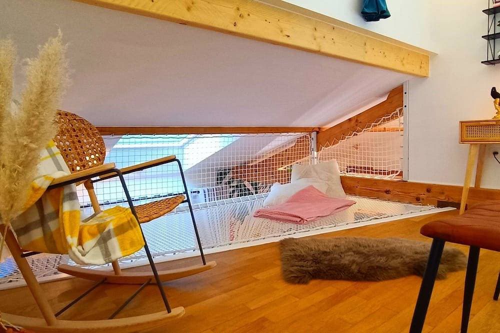 Foto 6 von 27: Cosy apartment with whirlpool bath in bedroom and catamaran net