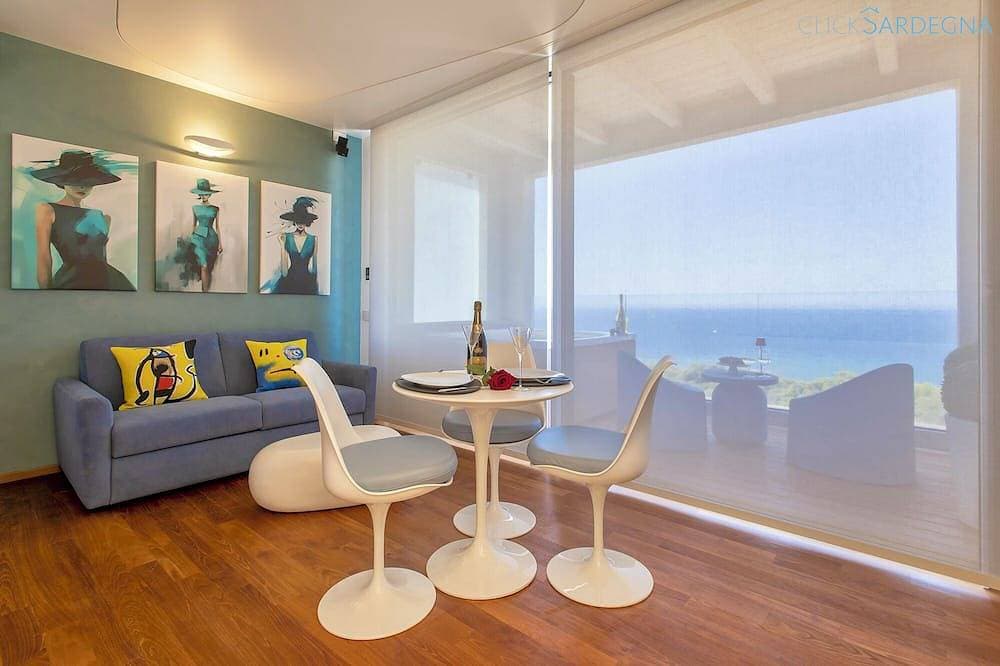 Foto 12 von 30: ClickSardinien Amare Penthouse mit Whirlpool auf Terrasse am Meer