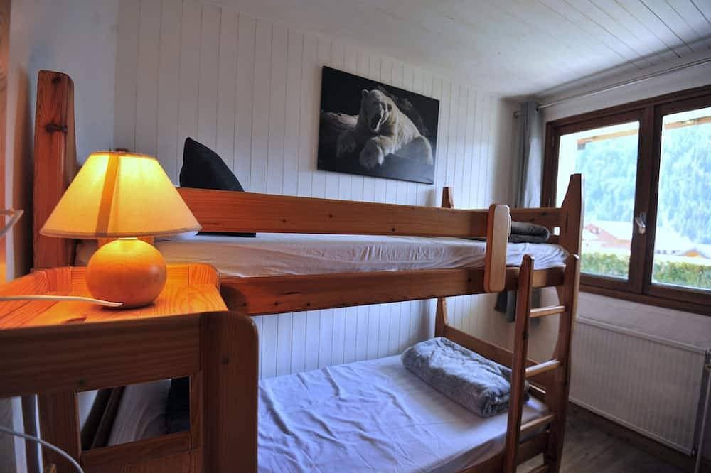 Foto 4 von 14: Wohnung D von Süden ausgerichteten Garten schönen Blick auf die Berge - Bas Crey