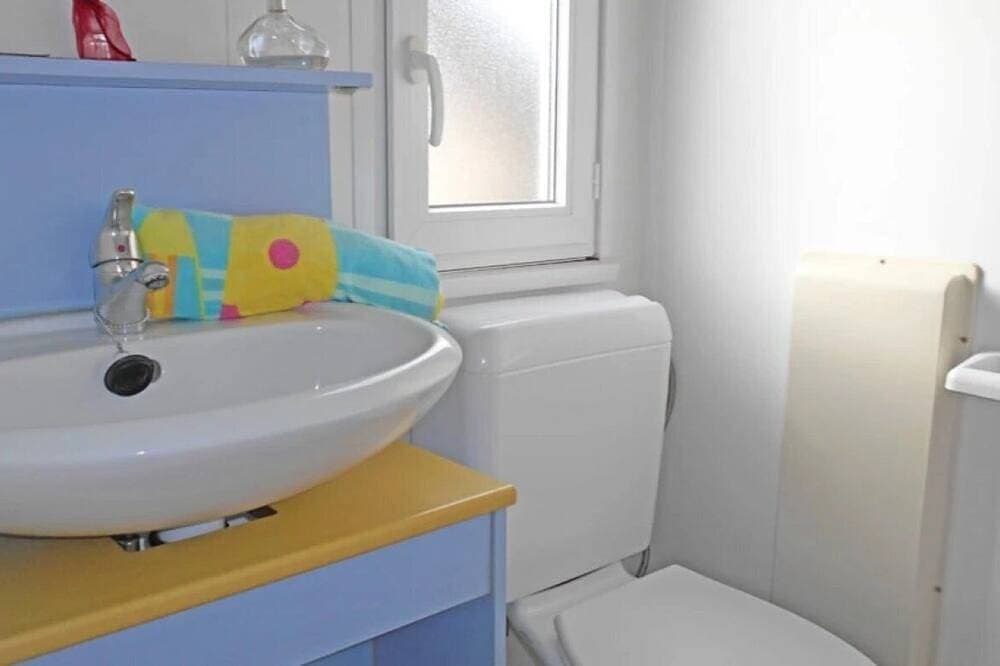 Foto 4 von 17: ZEcamping 3*  club enfant mobil-home TV 17m2 2 pers