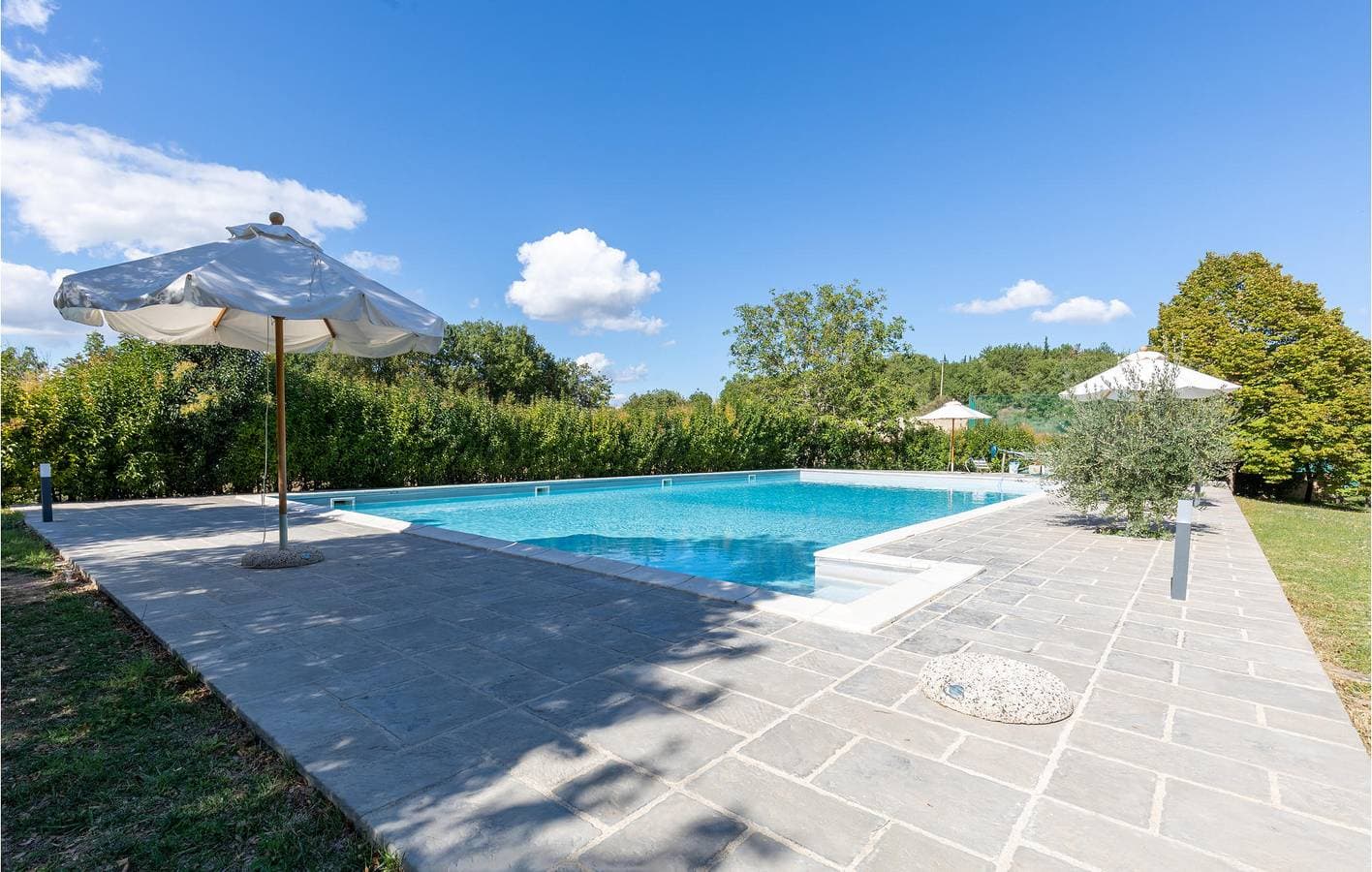Foto 11 von 31: Appartement in Hanglage mit Babybett, Pool und Parkplatz
