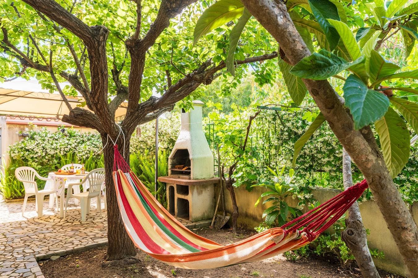 Foto 3 von 26: Ferienhaus 'Casa Nespolo' mit privatem Garten, Wi-Fi und Klimaanlage