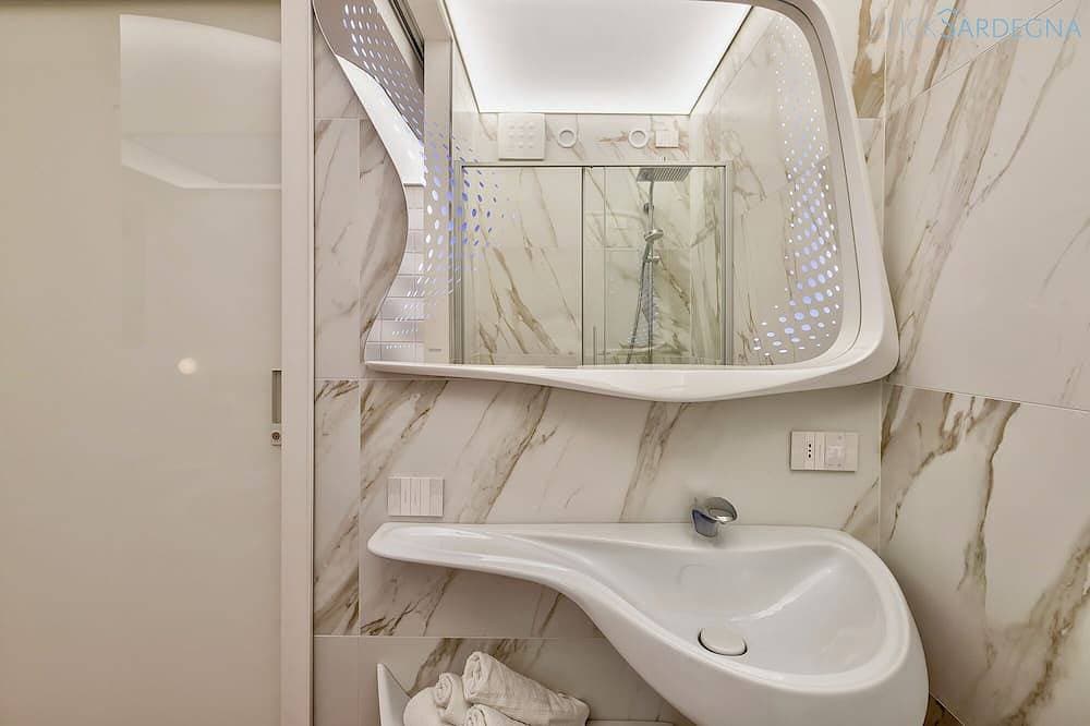 Foto 9 von 30: ClickSardinien Amare Penthouse mit Whirlpool auf Terrasse am Meer
