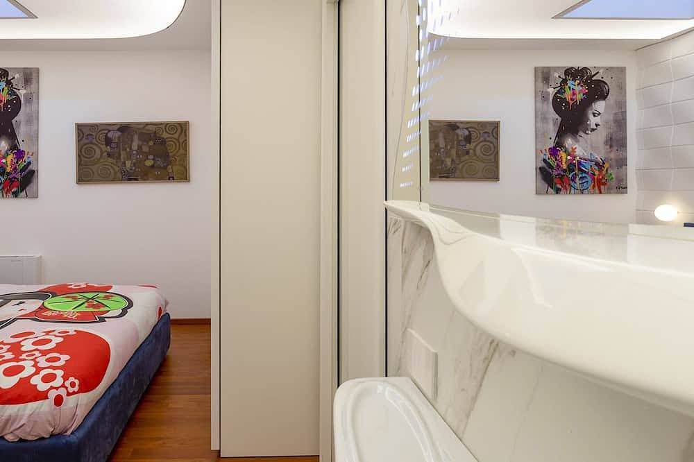 Foto 7 von 30: ClickSardinien Amare Penthouse mit Whirlpool auf Terrasse am Meer