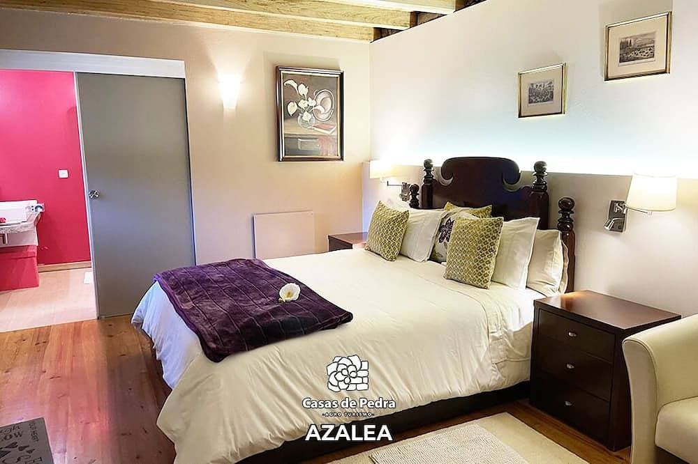 Foto 2 von 21: Casas de Pedra - Genießen Sie eine ländliche Atmosphäre mit allen Einrichtungen eines Hotels.