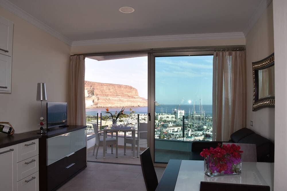 Foto 9 von 30: Apt. 1ºB \"Spectacular views of the sea and the marina of Puerto de Mogán\"