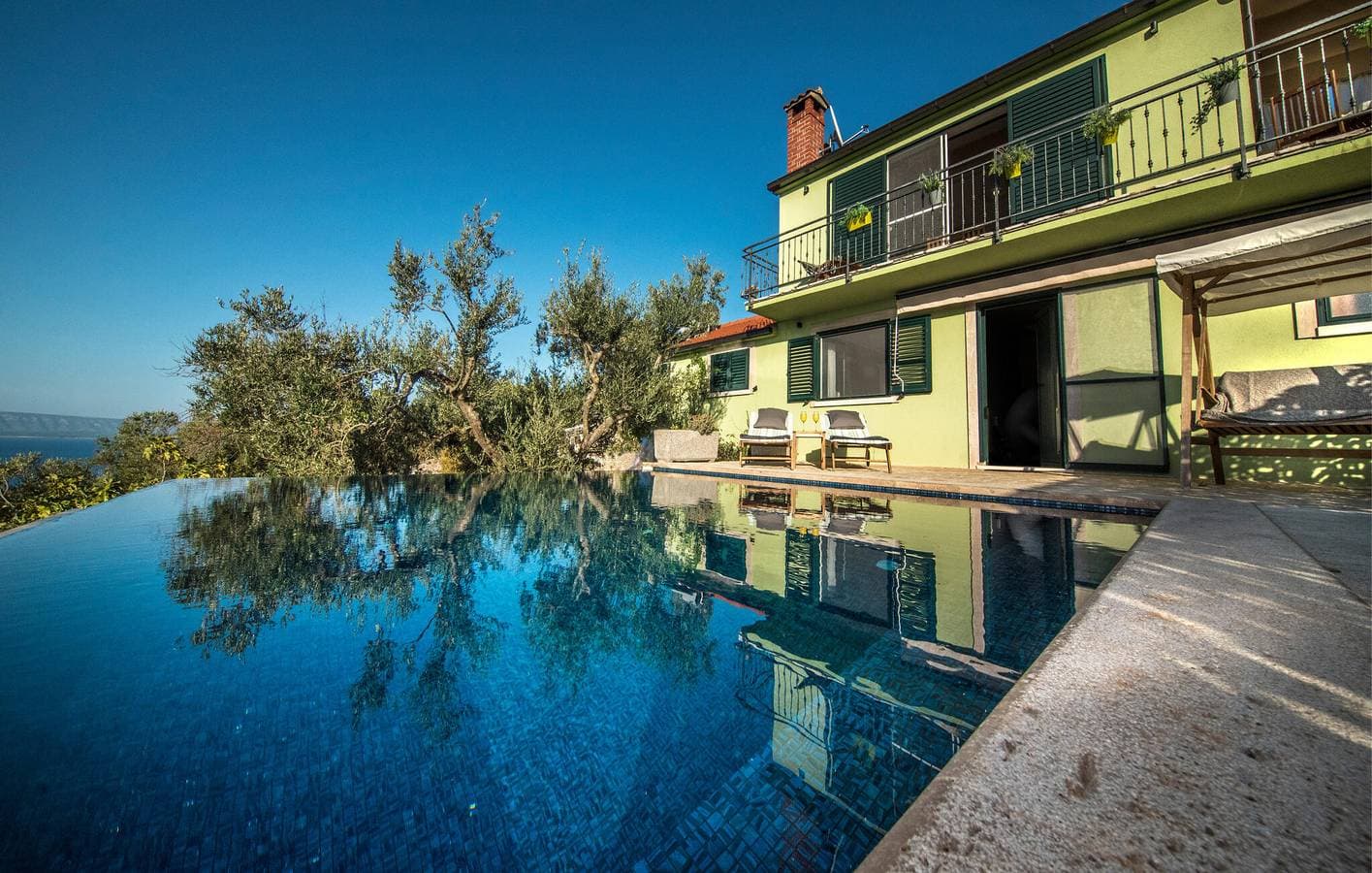Foto 8 von 30: Urlaub am Meer: Gemütliche Ferienwohnung mit Pool, Terrasse und Parkplatz