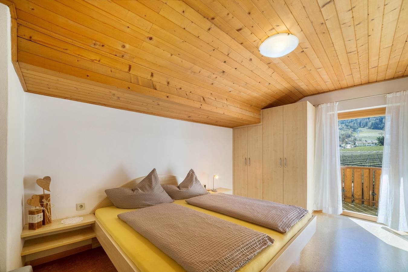 Foto 7 von 23: Ferienwohnung 'Typ A Pöder's Haus' mit Bergblick, Gemeinschaftsgarten und WLAN