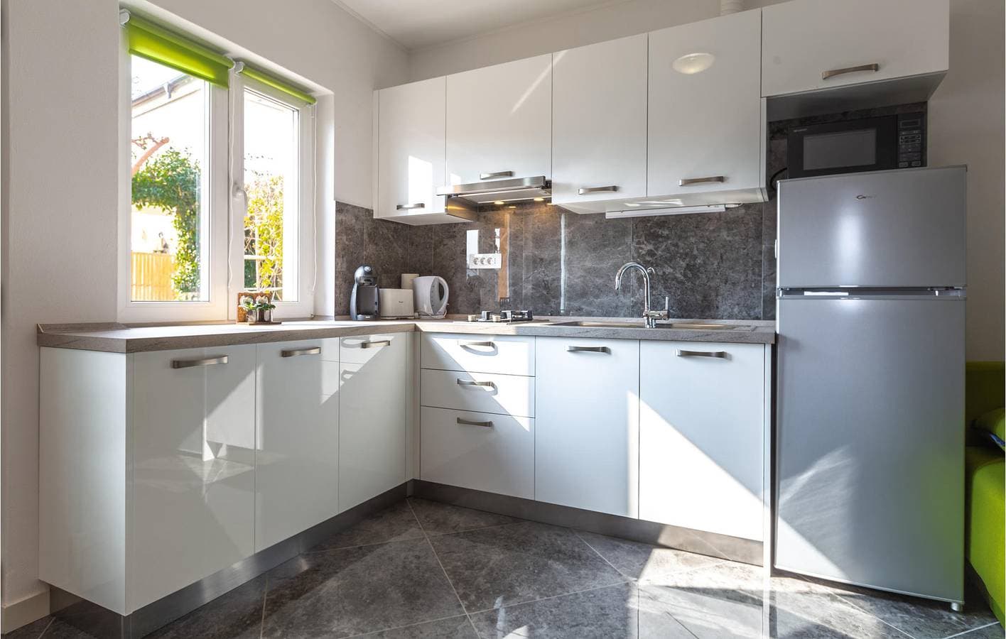 Foto 12 von 17: Ferienwohnung für 4 Personen mit Garten