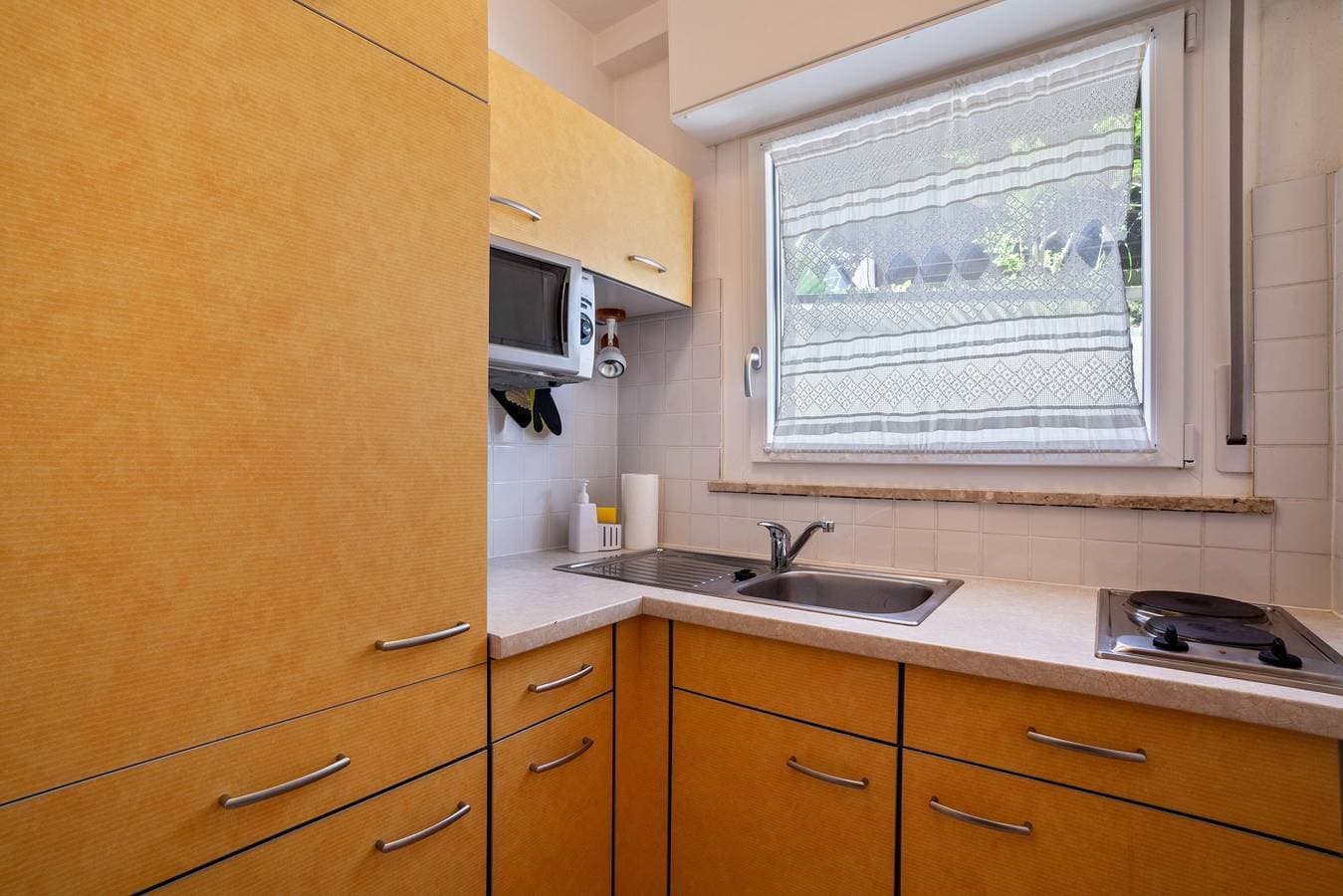 Foto 12 von 25: Ferienwohnung 'Ella' mit Bergblick, Pool (Juni - August), privater Terrasse und WLAN