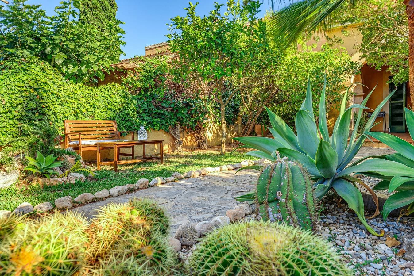 Foto 7 von 27: Ferienhaus "Can Om" mit Garten, Terrasse, Gemeinschaftspool & WLAN