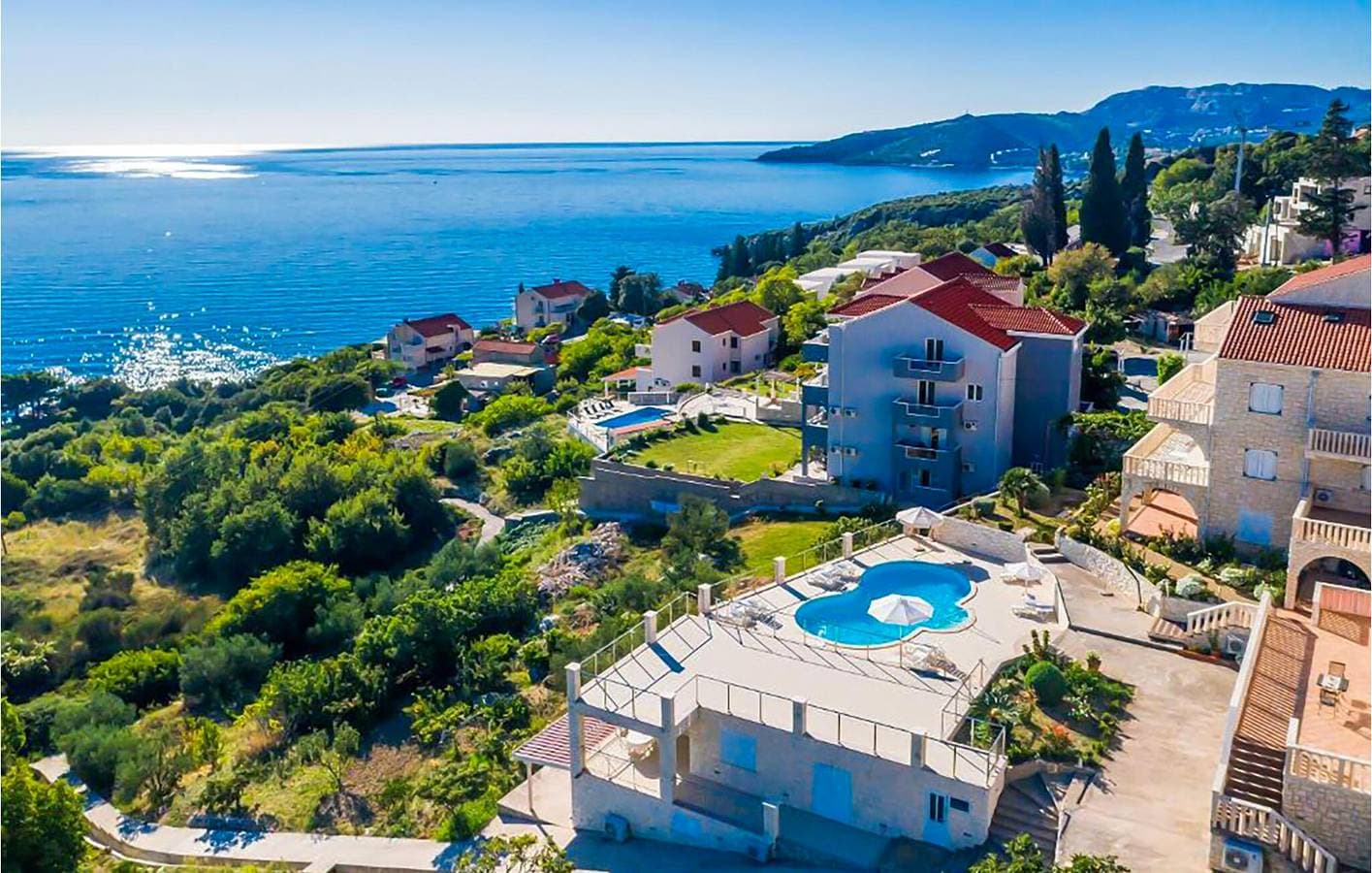 Foto 3 von 20: Apartment mit Meerblick, Pool, Terrasse und nur wenige Schritte vom Strand entfernt