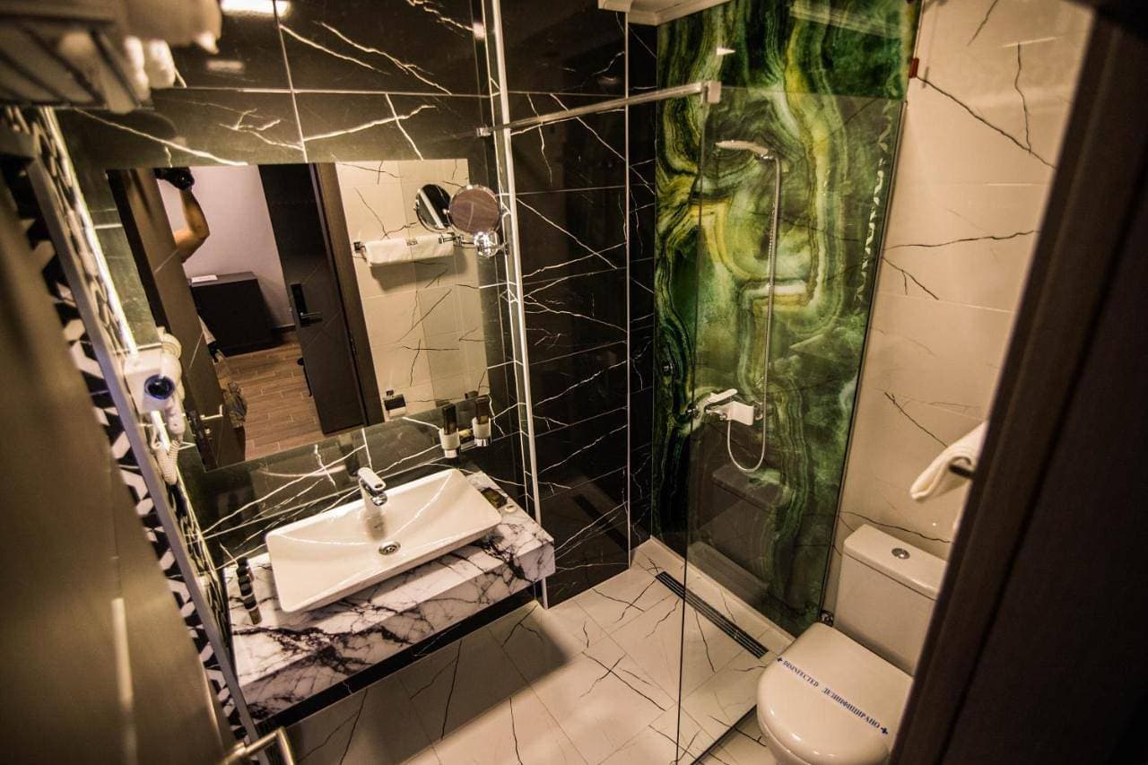 Foto 3 von 15: Deluxe Suite with Spa Bath