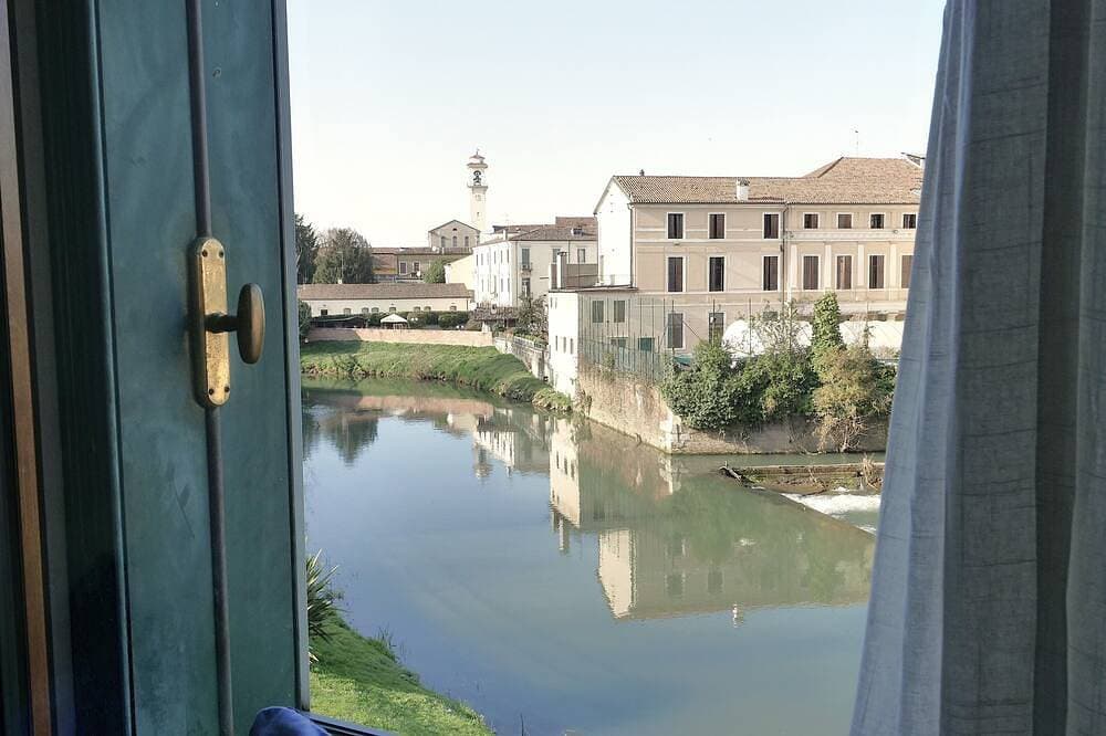 Foto 13 von 13: La Finestra sul Fiume - 5 min from the Basilica