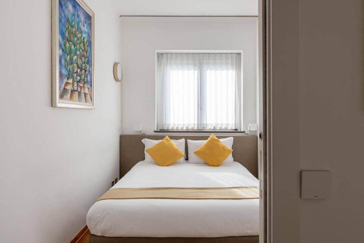 Foto 9 von 11: Three-Bedroom Apartment - Via Romagnosi 4