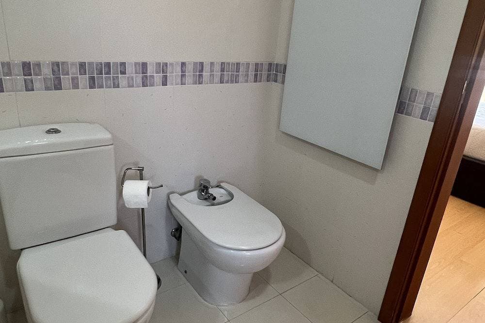 Foto 13 von 30: Cozy holiday 3 bed apartment - 5 minute drive to beach!
