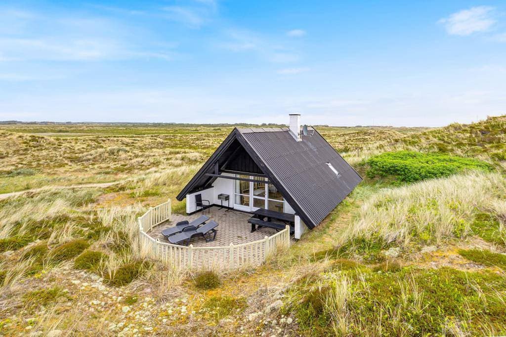 Gut gelegenes Ferienhaus mit Blick über die Dünenlandschaft 1