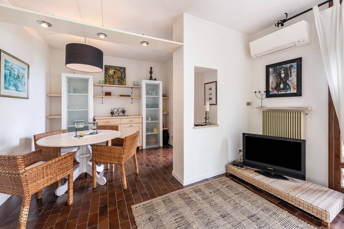 Foto 10 von 24: Ferienwohnung 'Villa Verde' mit Blick auf den See, Gemeinschaftspool und Klimaanlage