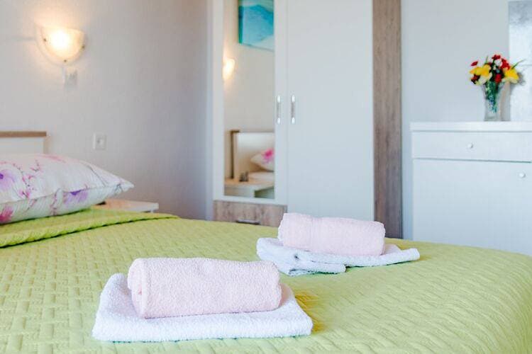 Foto 8 von 18: Rooms Sani - Double Room with Terrace and Sea View (S3)