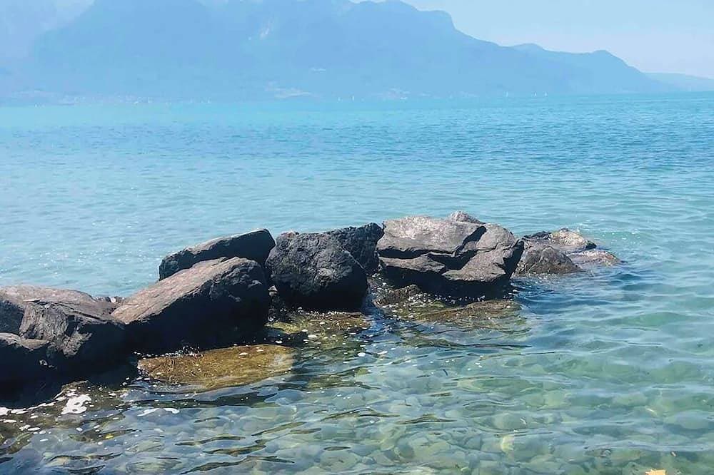 Foto 8 von 10: Chambre, Salle de Bain et Toilettes Privatifs Dans Appartement à 2 pas du lac