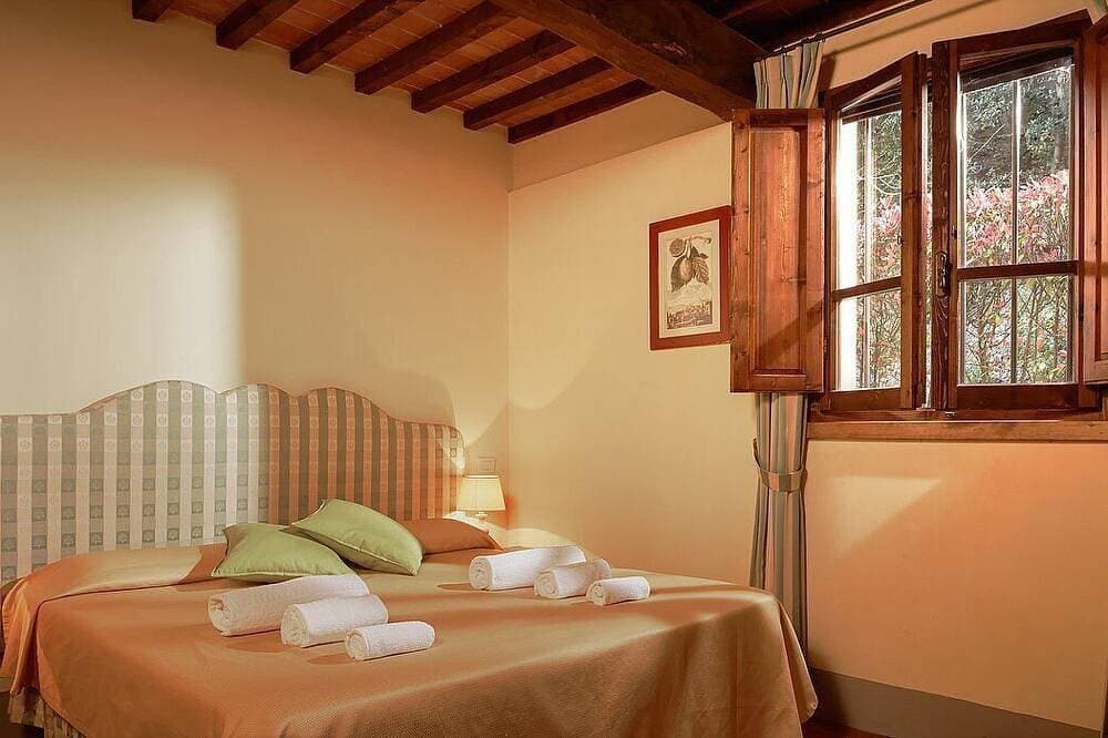 Foto 2 von 26: Casa Ramisia A: A characteristic and welcoming two-story apartment surrounded by a wonderful park, with Free Wi-Fi.
