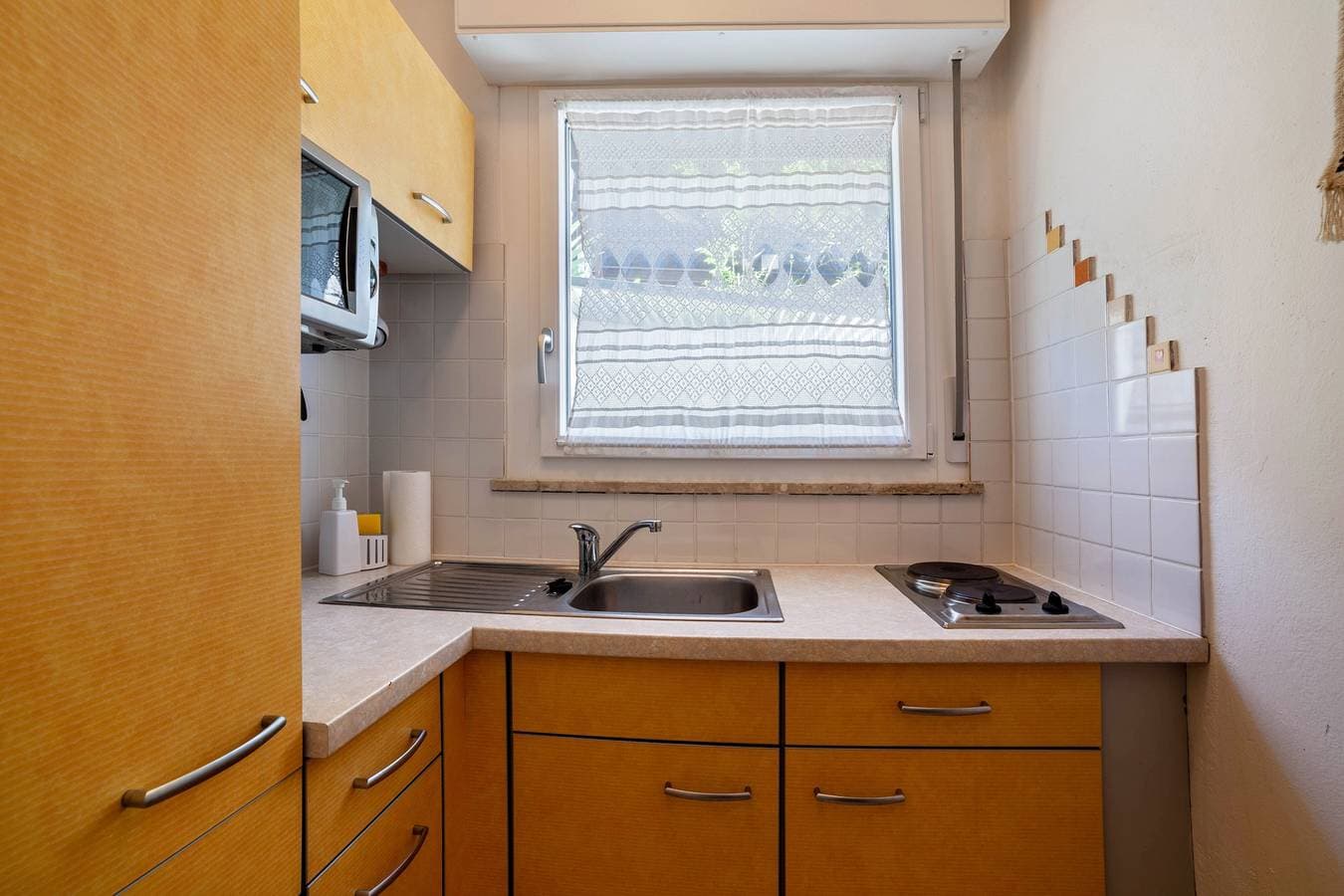 Foto 13 von 25: Ferienwohnung 'Ella' mit Bergblick, Pool (Juni - August), privater Terrasse und WLAN