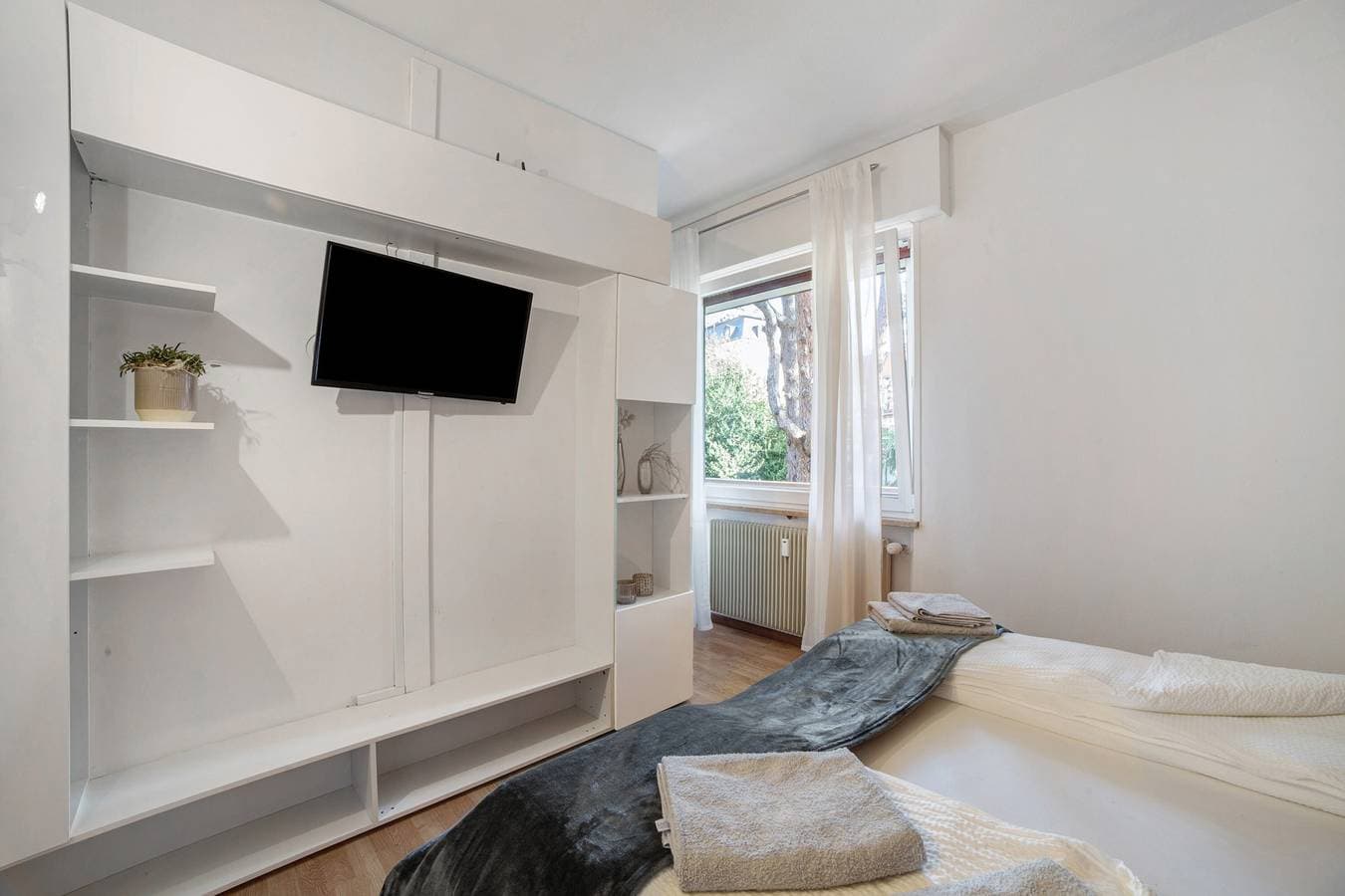 Foto 13 von 22: Ferienwohnung 'Modern Park' mit Gemeinschaftsgarten, Balkon und Wi-Fi