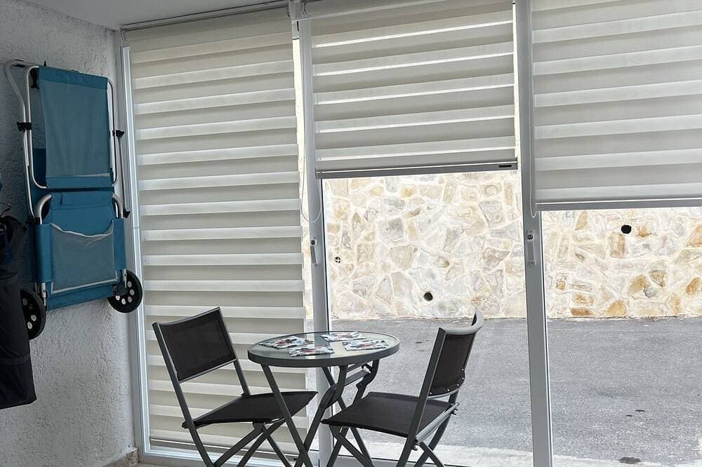 Foto 9 von 30: Albir Apartment in Haus mit Gemeinschaftspool, mit dem Garten