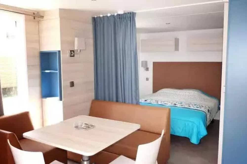 Foto 3 von 14: ZEcamping 4 étoiles piscine extérieur locatif TV Lv clim 20m2 2 pers