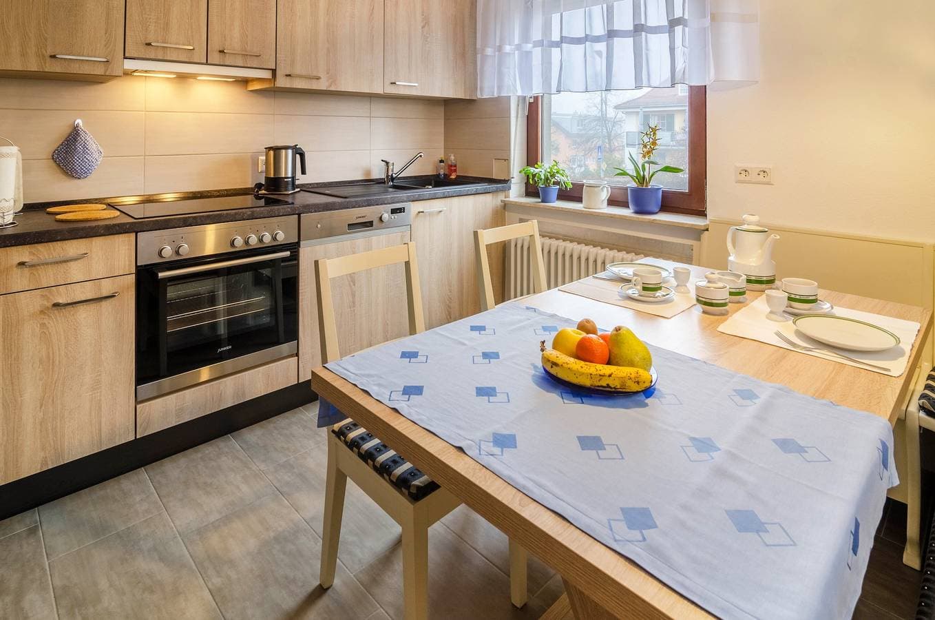 Foto 7 von 26: Ferienwohnung Kramer mit WLAN, Terrasse & Gemeinschaftsgarten